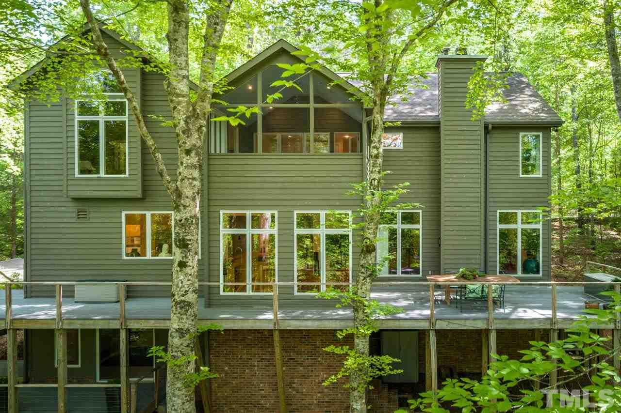 5415 Taproot Lane Durham, NC 27705 - Photo 30 of 30 a view of a brick house with a yard