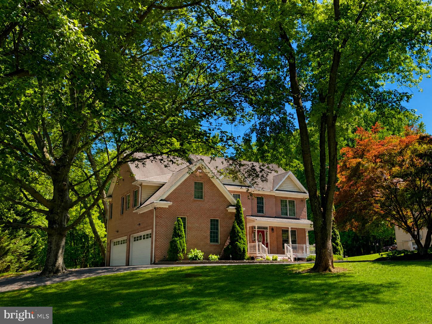 Private Brick Colonial in a Picturesque Setting