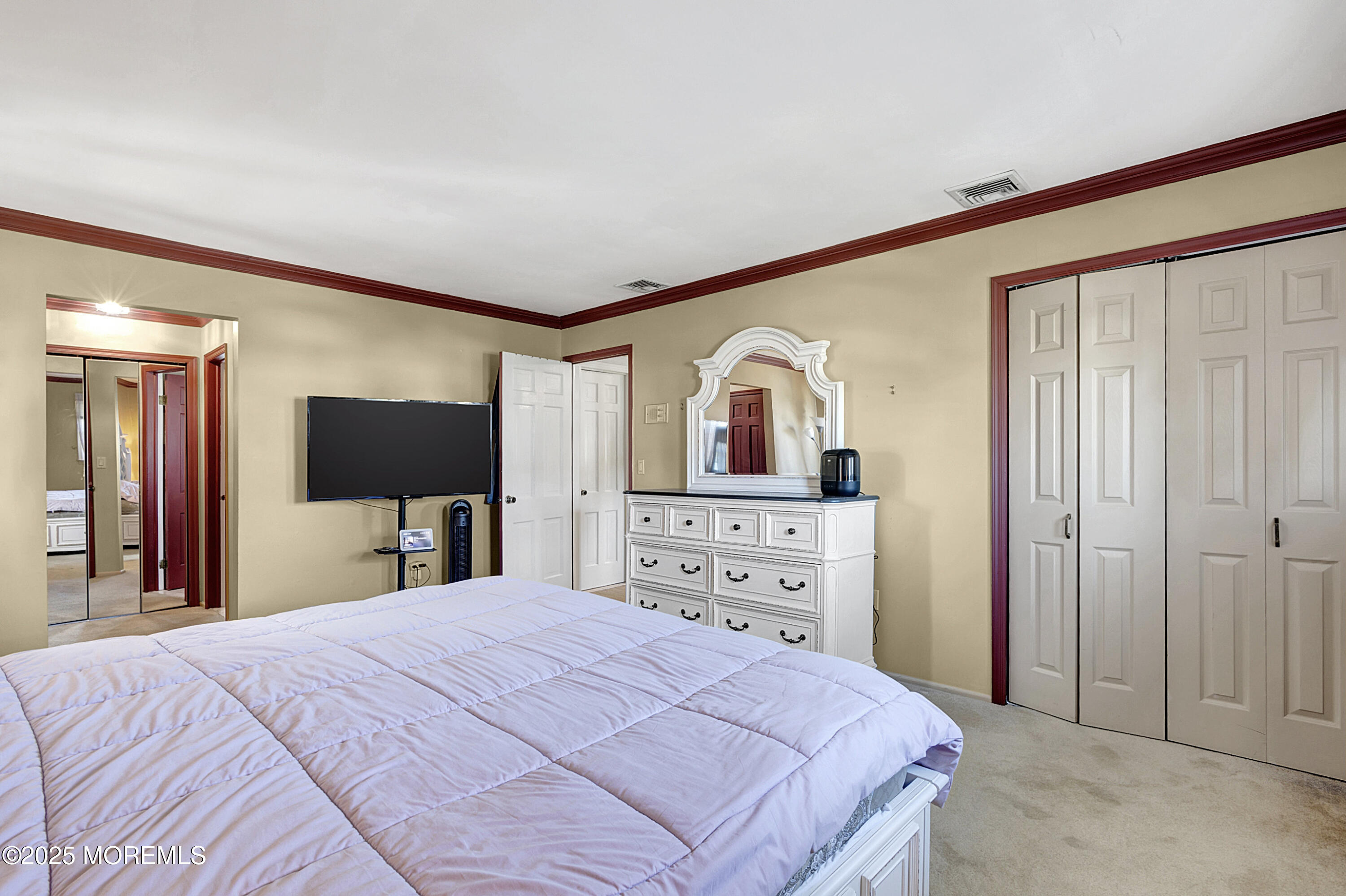 32 Kilfoyle Avenue Fords, NJ 08863 - Photo 21 of 33 a bedroom with a bed and a flat screen tv