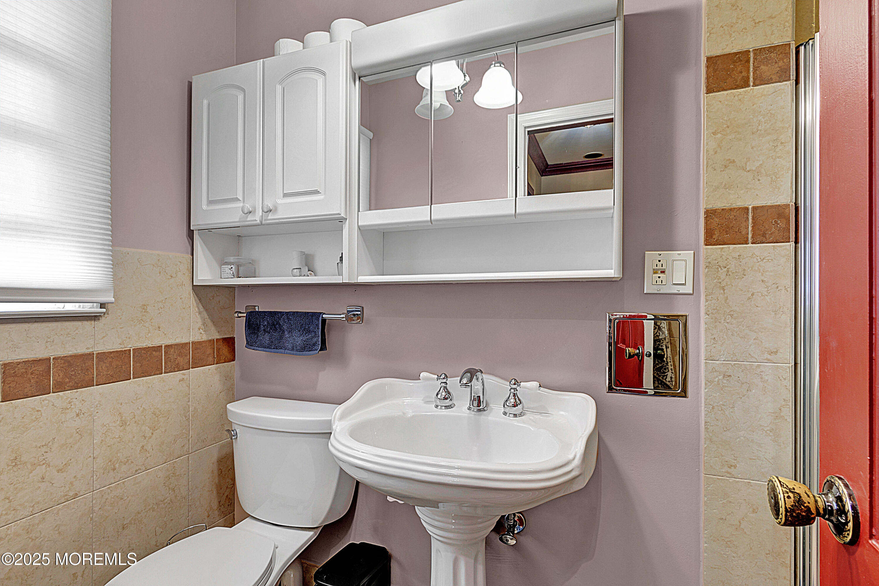 32 Kilfoyle Avenue Fords, NJ 08863 - Photo 22 of 33 a bathroom with a sink a toilet and mirror