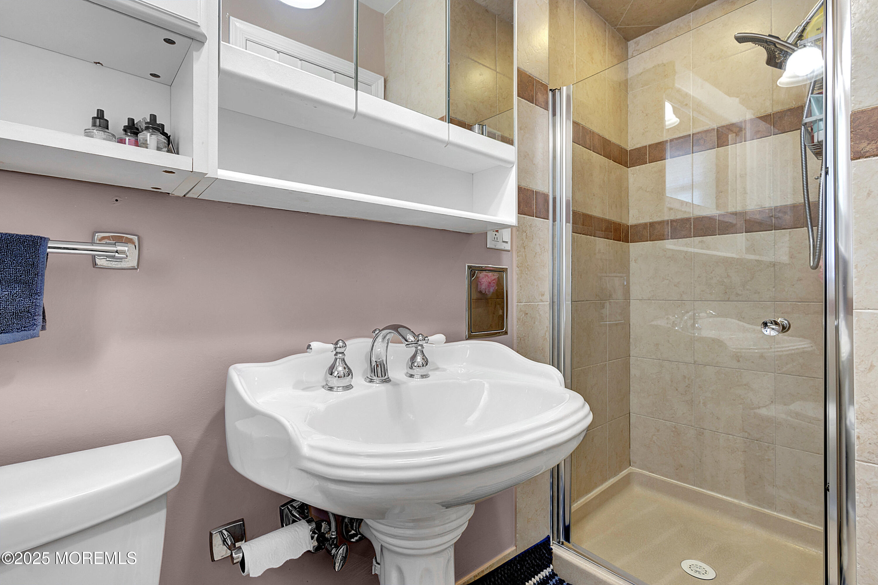 32 Kilfoyle Avenue Fords, NJ 08863 - Photo 23 of 33 a bathroom with a sink and a mirror