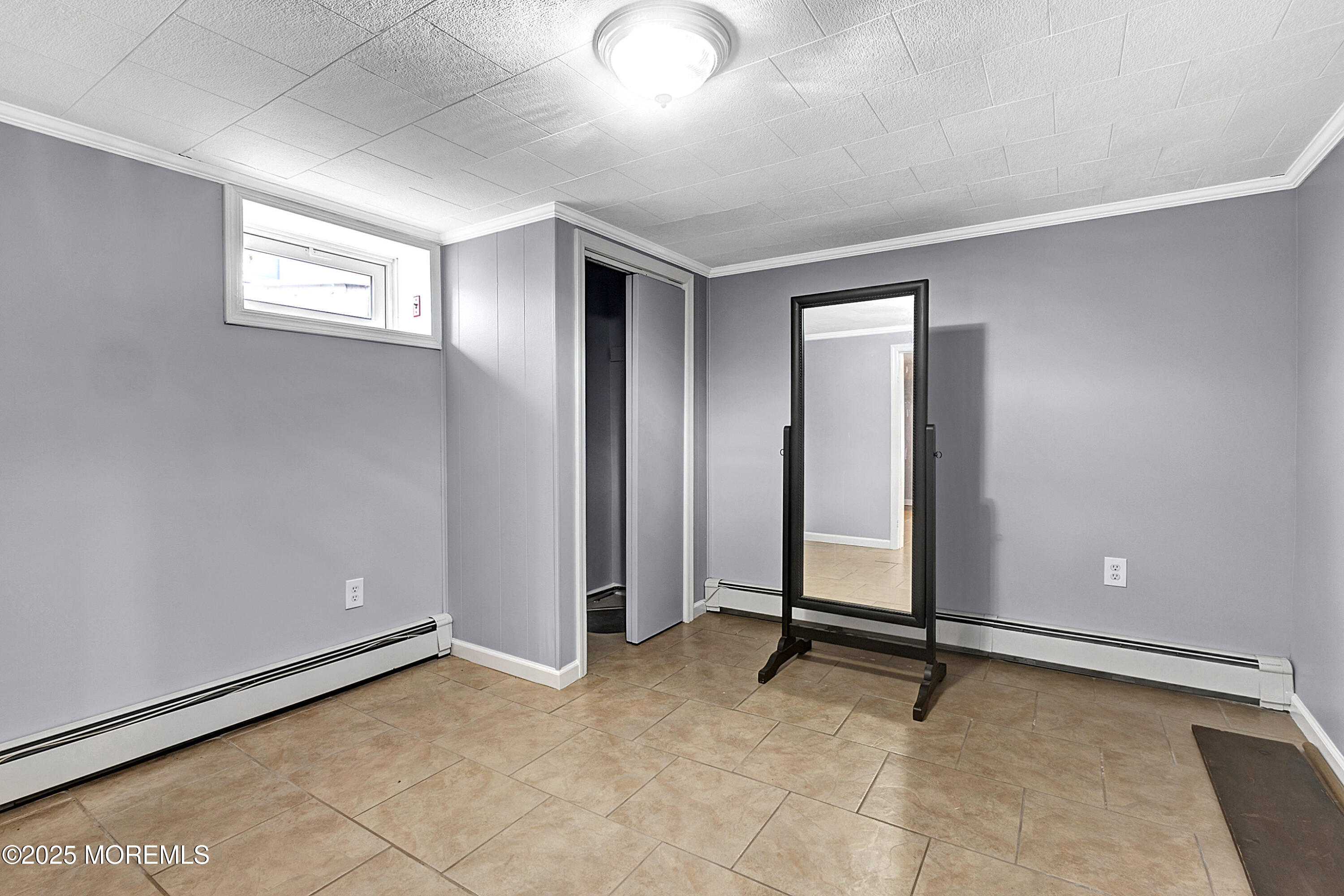 32 Kilfoyle Avenue Fords, NJ 08863 - Photo 27 of 33 an empty room with windows