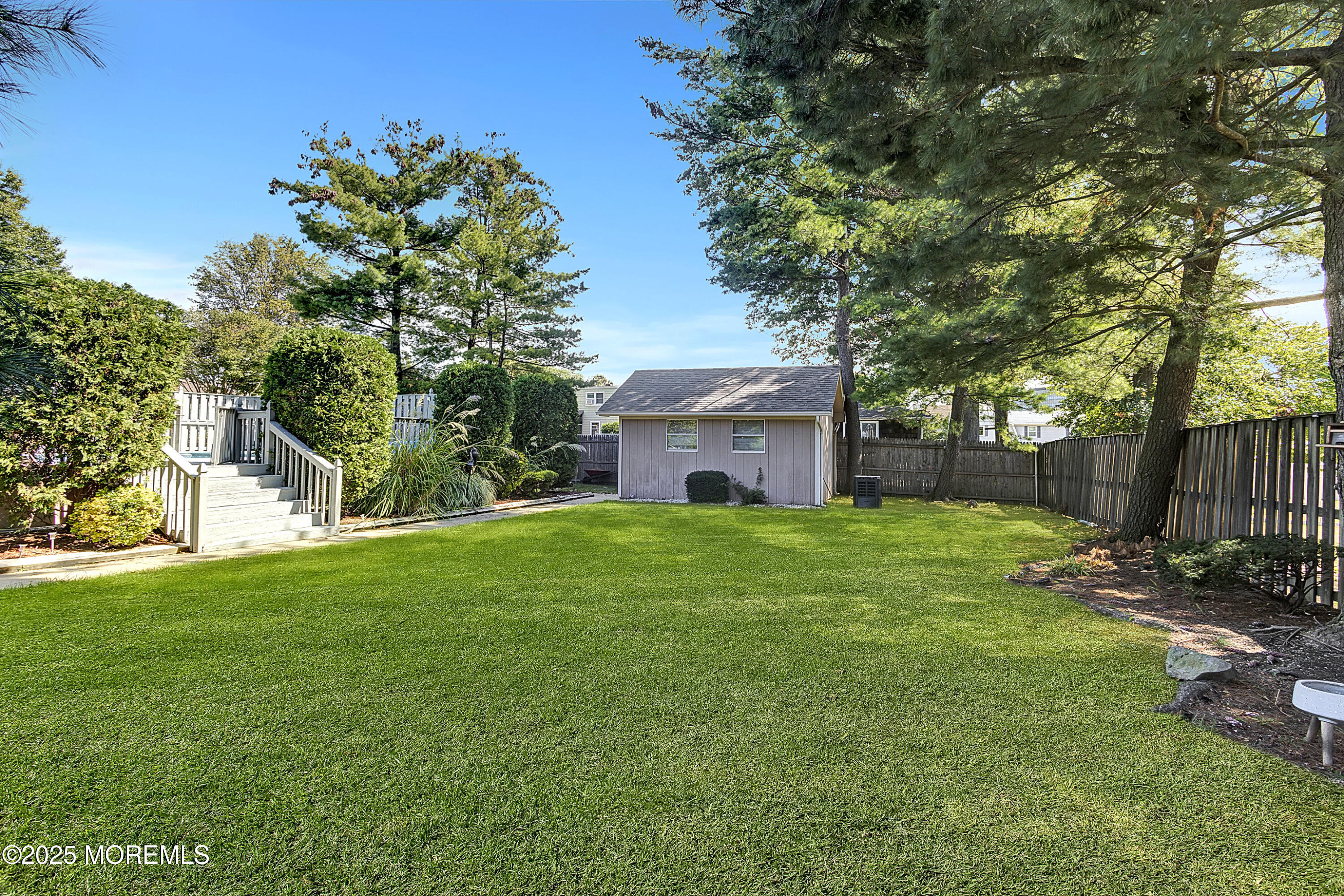 32 Kilfoyle Avenue Fords, NJ 08863 - Photo 31 of 33 a front view of a house with a garden and yard
