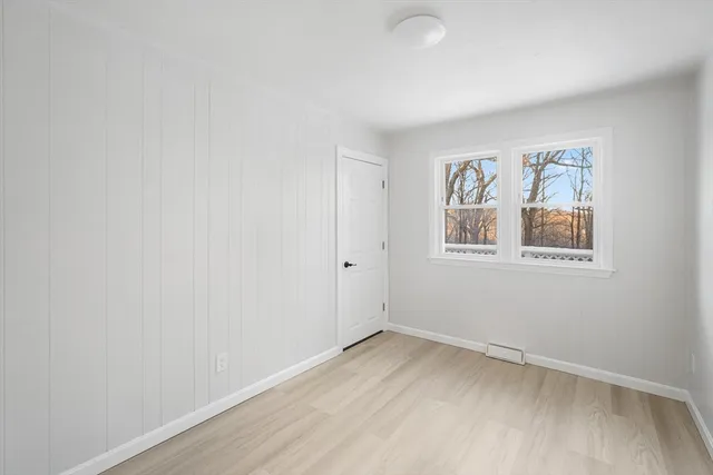 a bathroom with a toilet a sink and a bathtub