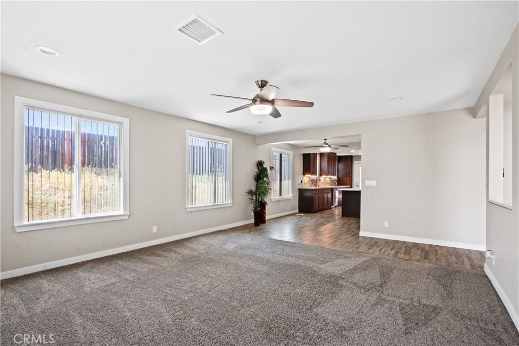 8410 Arrow Route Rancho Cucamonga, CA 91730 - Photo 6 of 24 a view of an empty room with a window