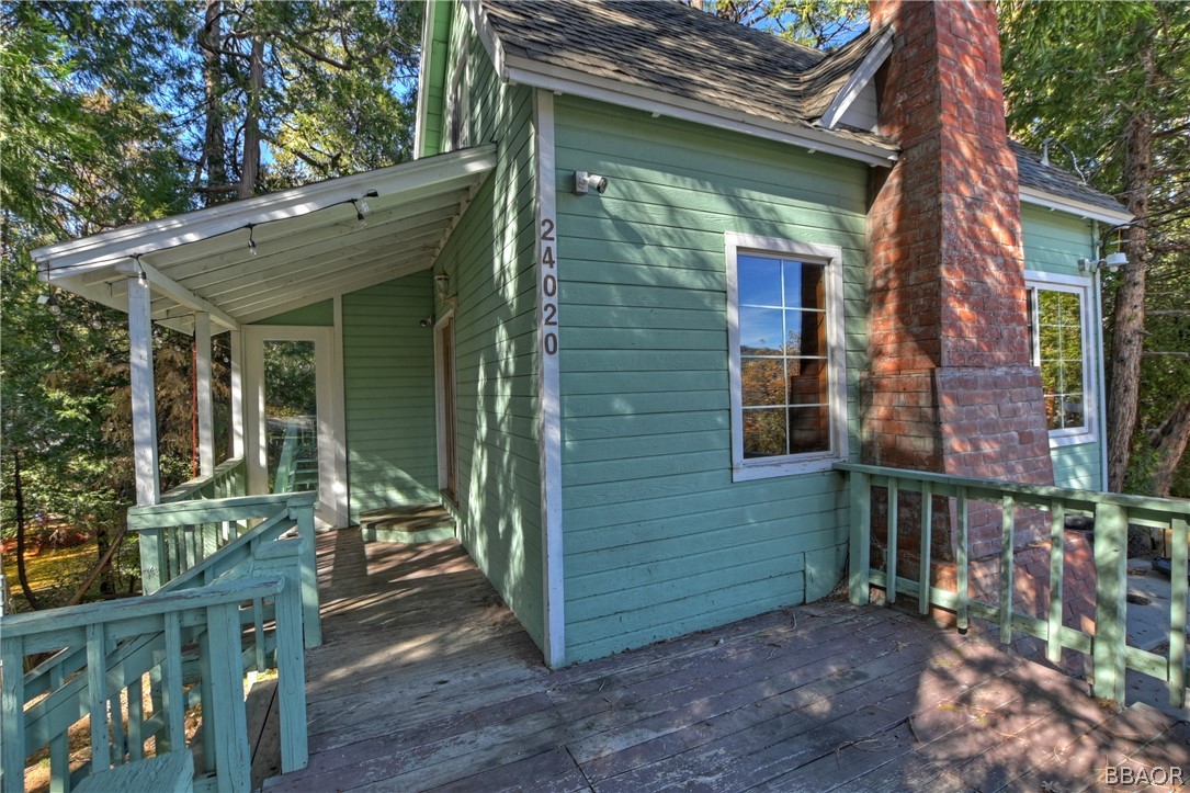 24020 Bowl Road Crestline, CA 92325 - Photo 30 of 35 a view of brick house with a large windows