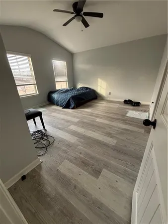 a utility room with a stove a washer and dryer