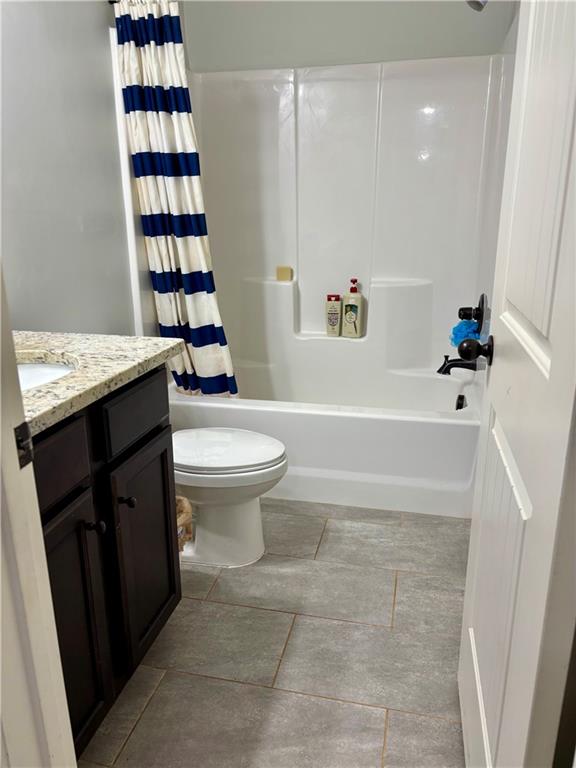 328 Vantage Point Locust Grove, GA 30248 - Photo 19 of 33 a bathroom with a sink a toilet and shower