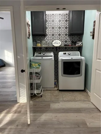 a view of entryway with wooden floor