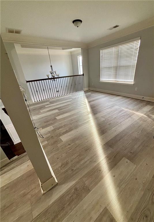 328 Vantage Point Locust Grove, GA 30248 - Photo 24 of 33 a view of a room with wooden floor and windows