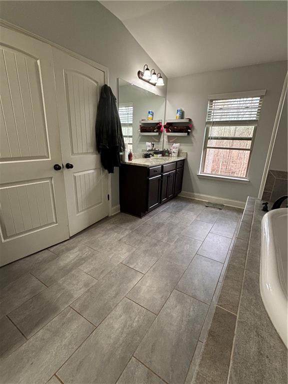 328 Vantage Point Locust Grove, GA 30248 - Photo 27 of 33 a kitchen with a sink a counter space cabinets and appliances
