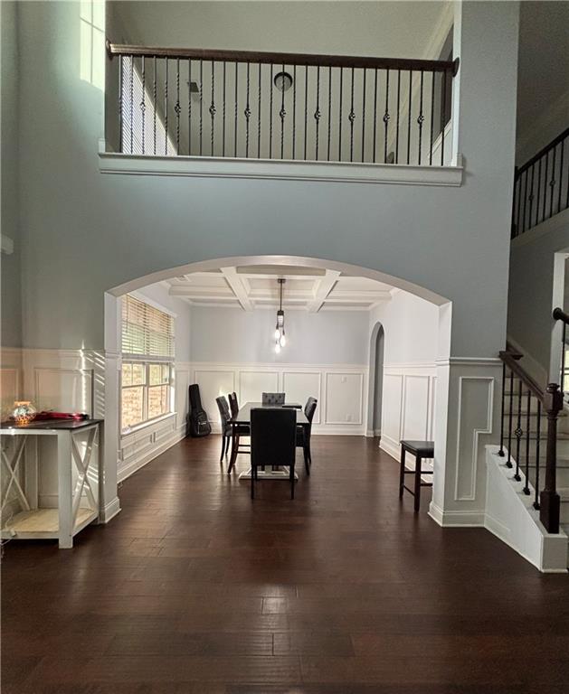 328 Vantage Point Locust Grove, GA 30248 - Photo 3 of 33 a view of a livingroom with furniture wooden floor windows and a fireplace