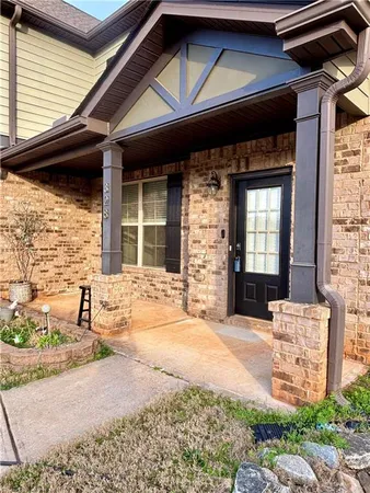 a sign that is sitting in front of a building