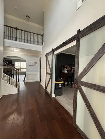 a view of livingroom with furniture and hardwood floor