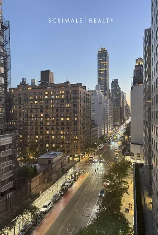 a view of a city with tall buildings