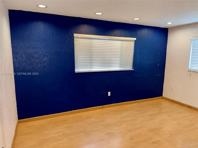 a view of an entryway with a door