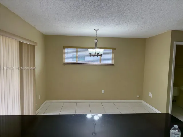 a view of a room that has a window