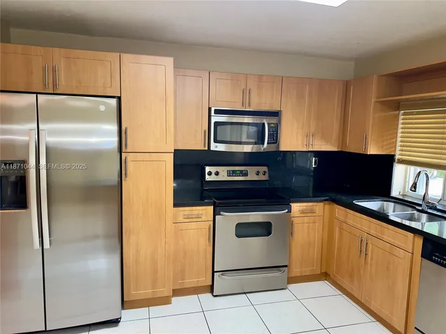 $1,049,000 | 1890 Northeast 211th Terrace, Miami, FL 33179