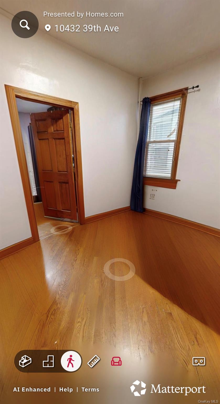 104-32 39th Avenue Queens, NY 11368 - Photo 8 of 11 a view of livingroom with window