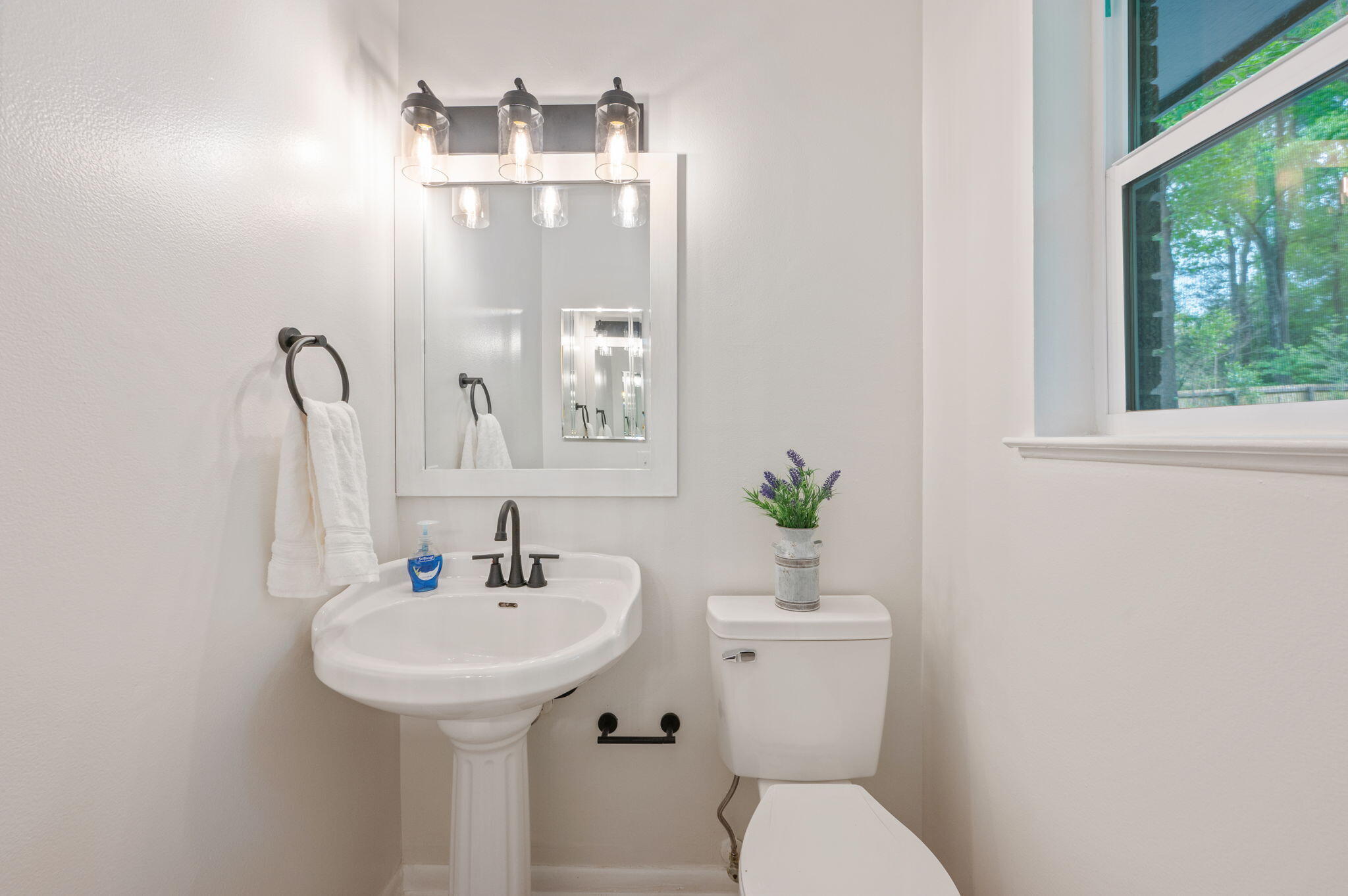 128 Salvadore Drive Crestview, FL 32536 - Photo 16 of 30 a bathroom with a sink toilet and a mirror