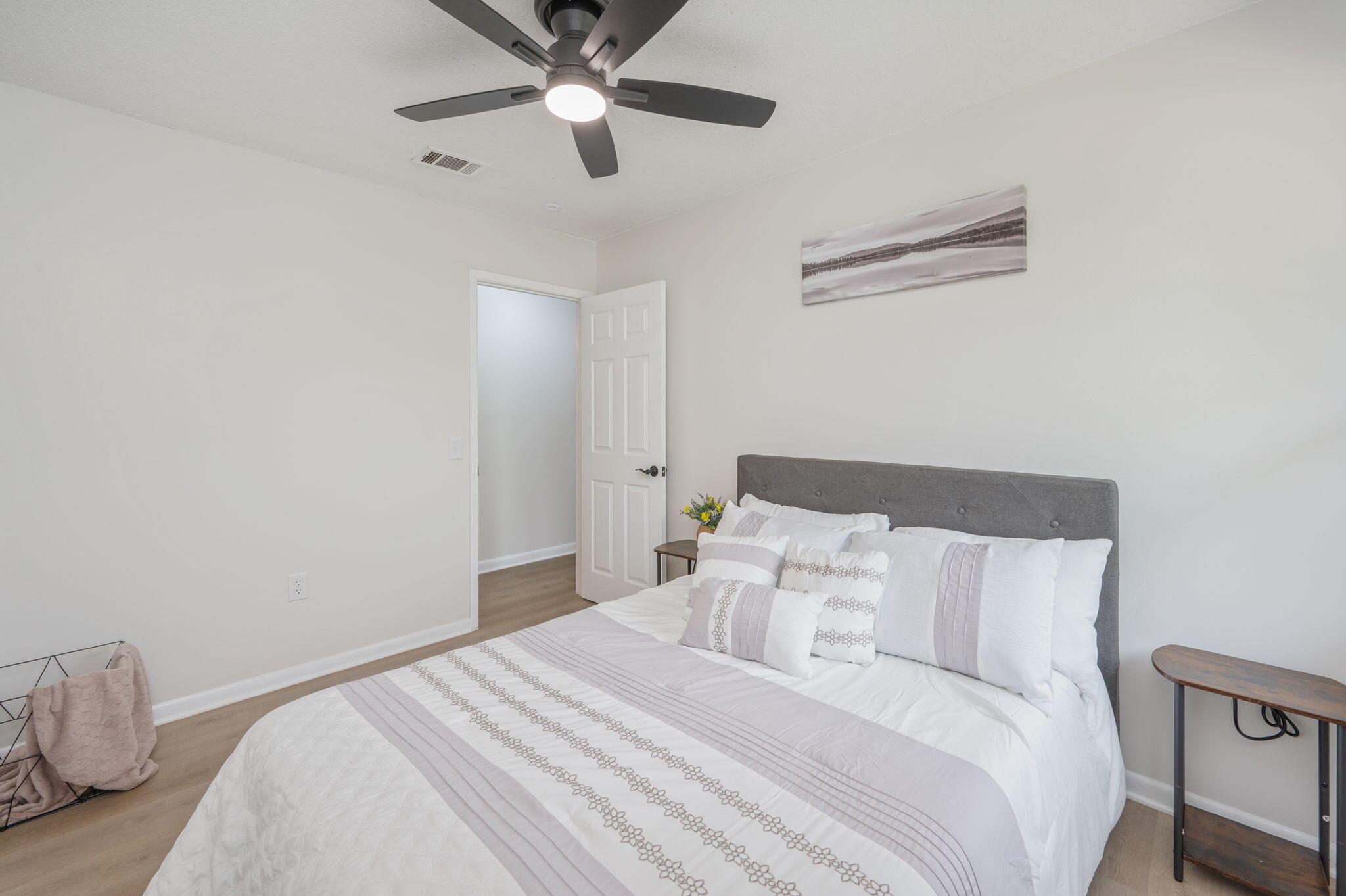 128 Salvadore Drive Crestview, FL 32536 - Photo 20 of 30 a bedroom with a bed and a ceiling fan