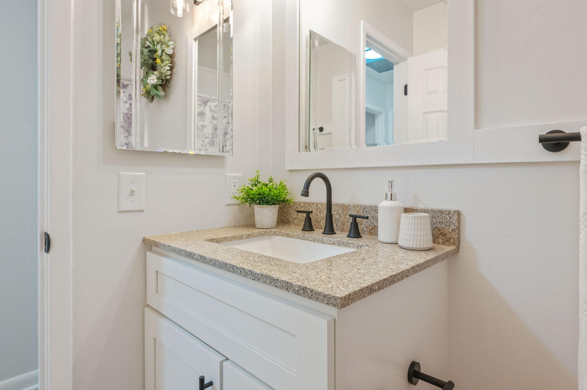 128 Salvadore Drive Crestview, FL 32536 - Photo 22 of 30 a bathroom with a granite countertop sink and a mirror