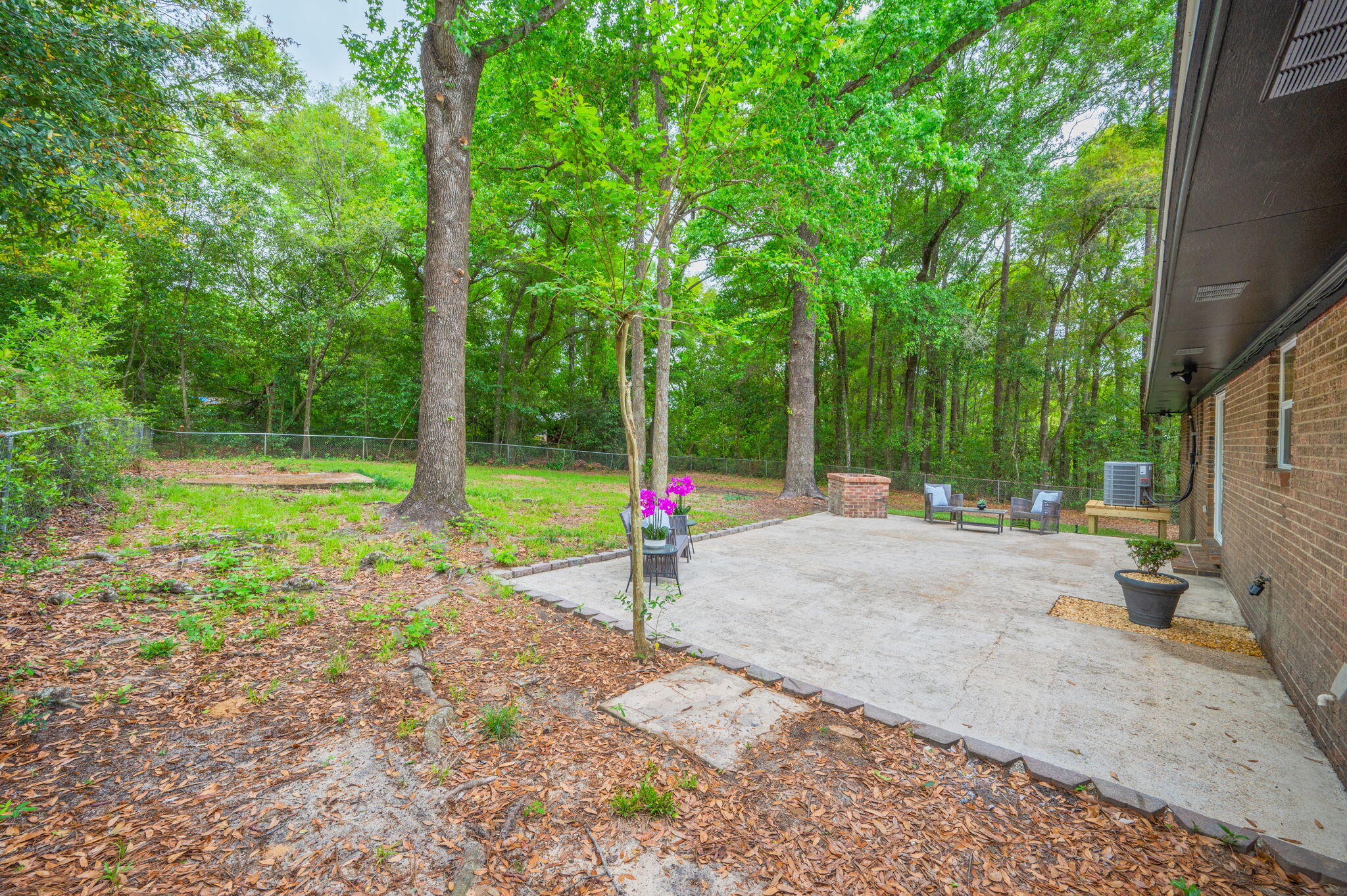 128 Salvadore Drive Crestview, FL 32536 - Photo 27 of 30 a view of a park with swings and slides