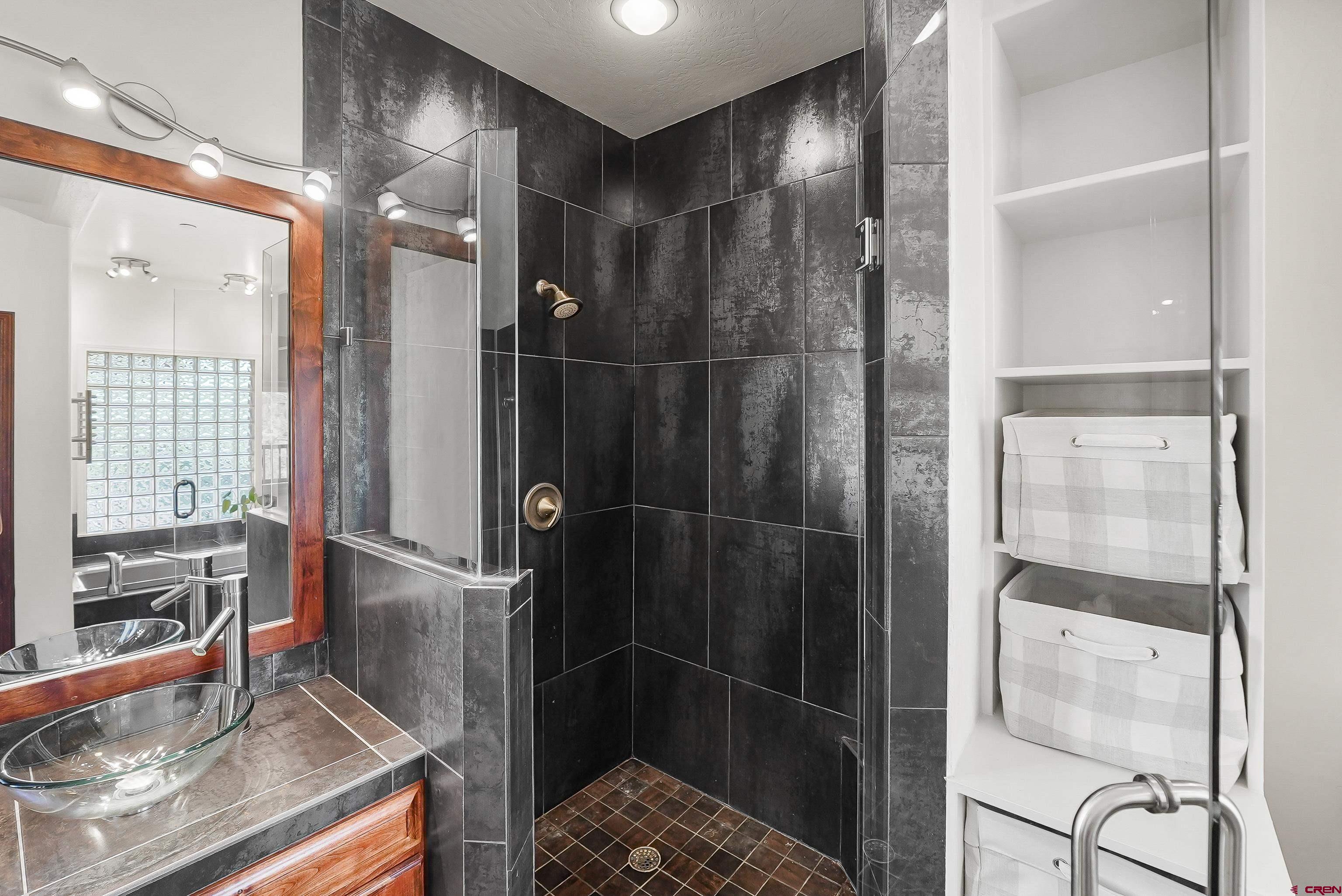 287 Wildcat Road Hesperus, CO 81326 - Photo 19 of 44 a bathroom with a shower and a sink