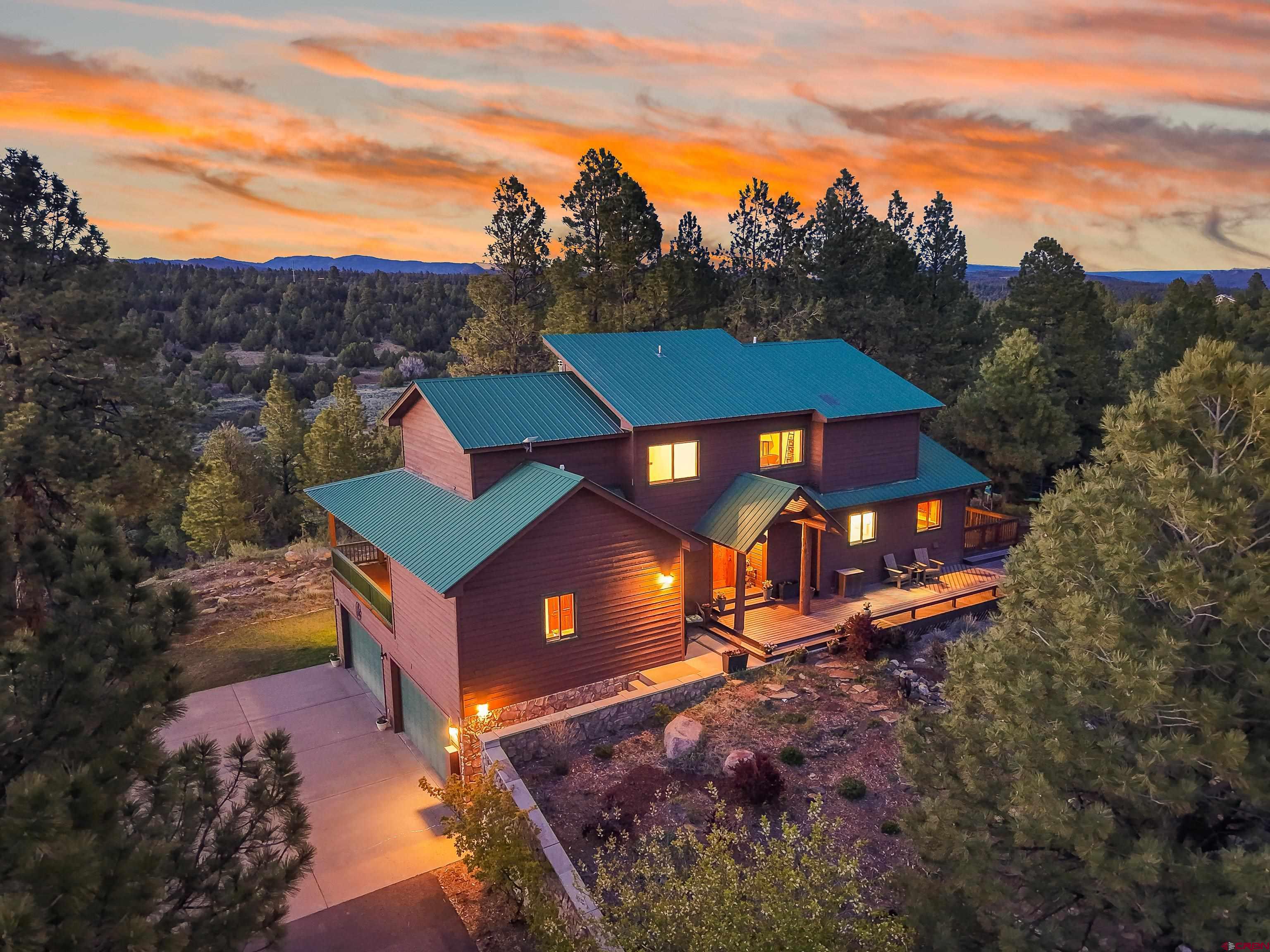 287 Wildcat Road Hesperus, CO 81326 - Photo 2 of 44 a view of a house with a yard