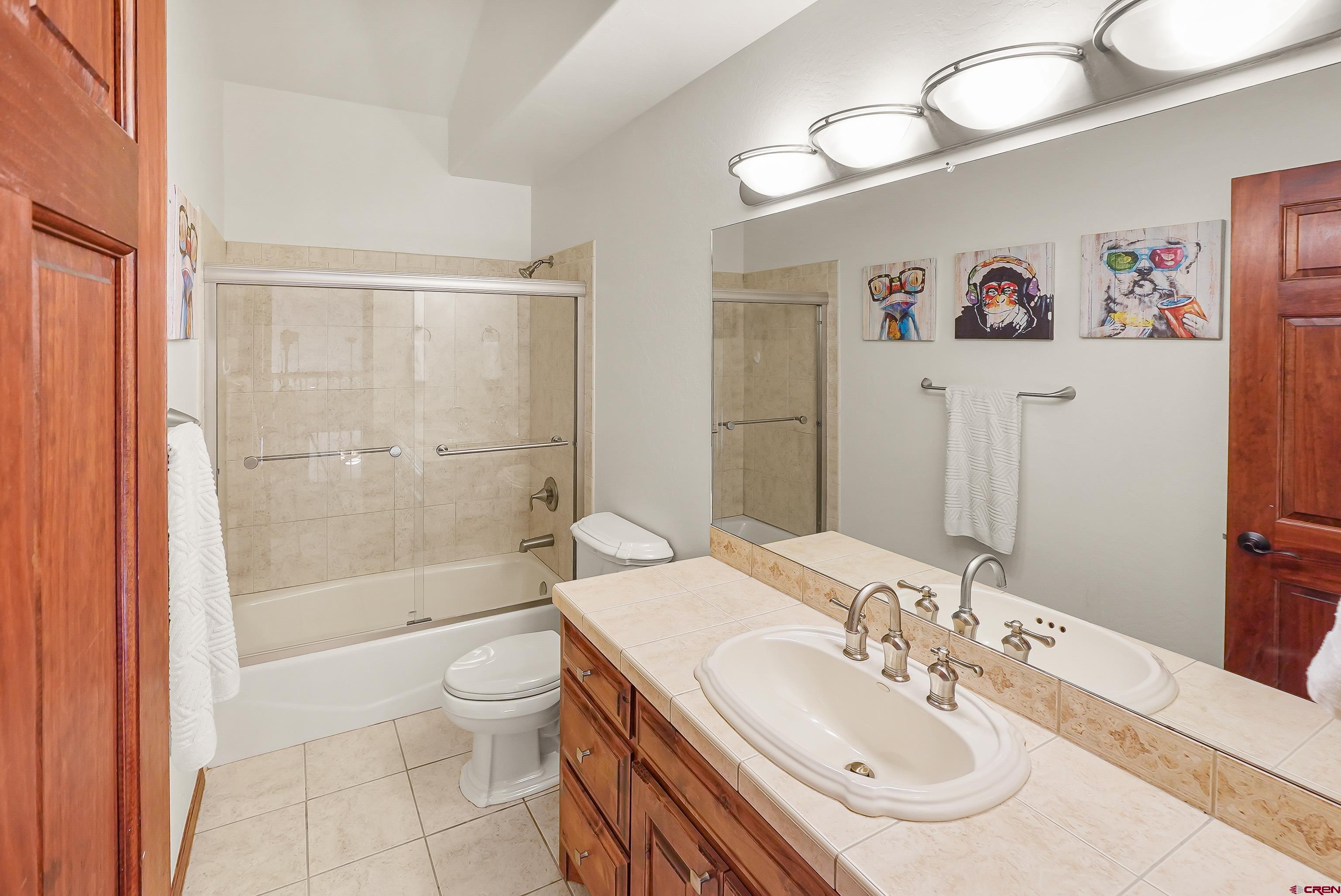 287 Wildcat Road Hesperus, CO 81326 - Photo 22 of 44 a bathroom with a sink a toilet and shower