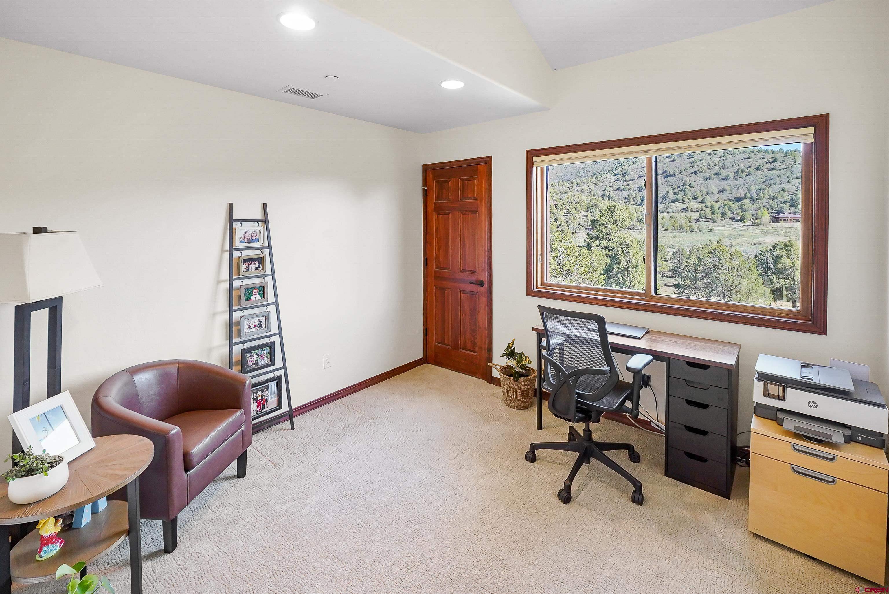 287 Wildcat Road Hesperus, CO 81326 - Photo 23 of 44 a view of a livingroom with furniture and a window
