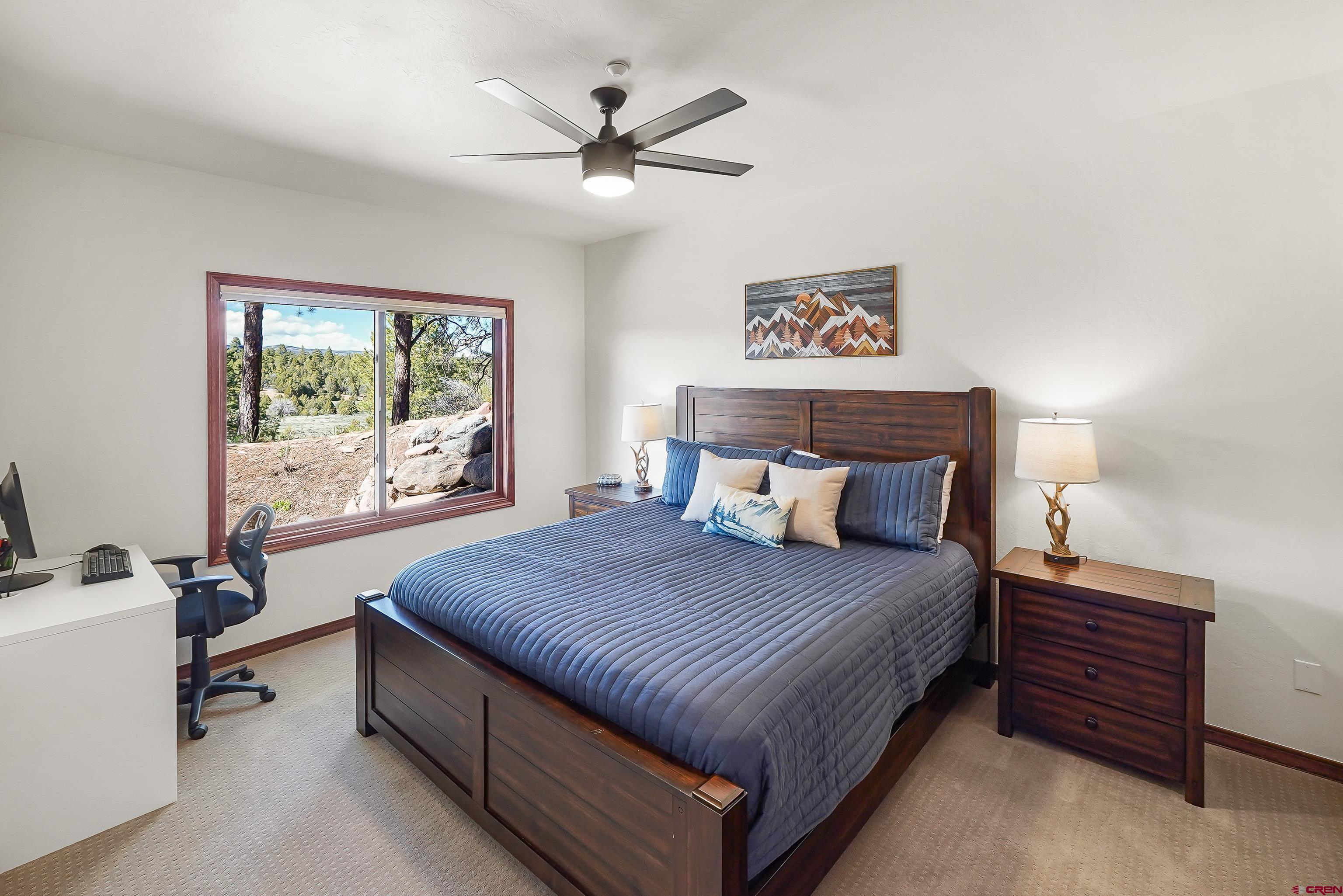 287 Wildcat Road Hesperus, CO 81326 - Photo 30 of 44 a bedroom with a bed and a table