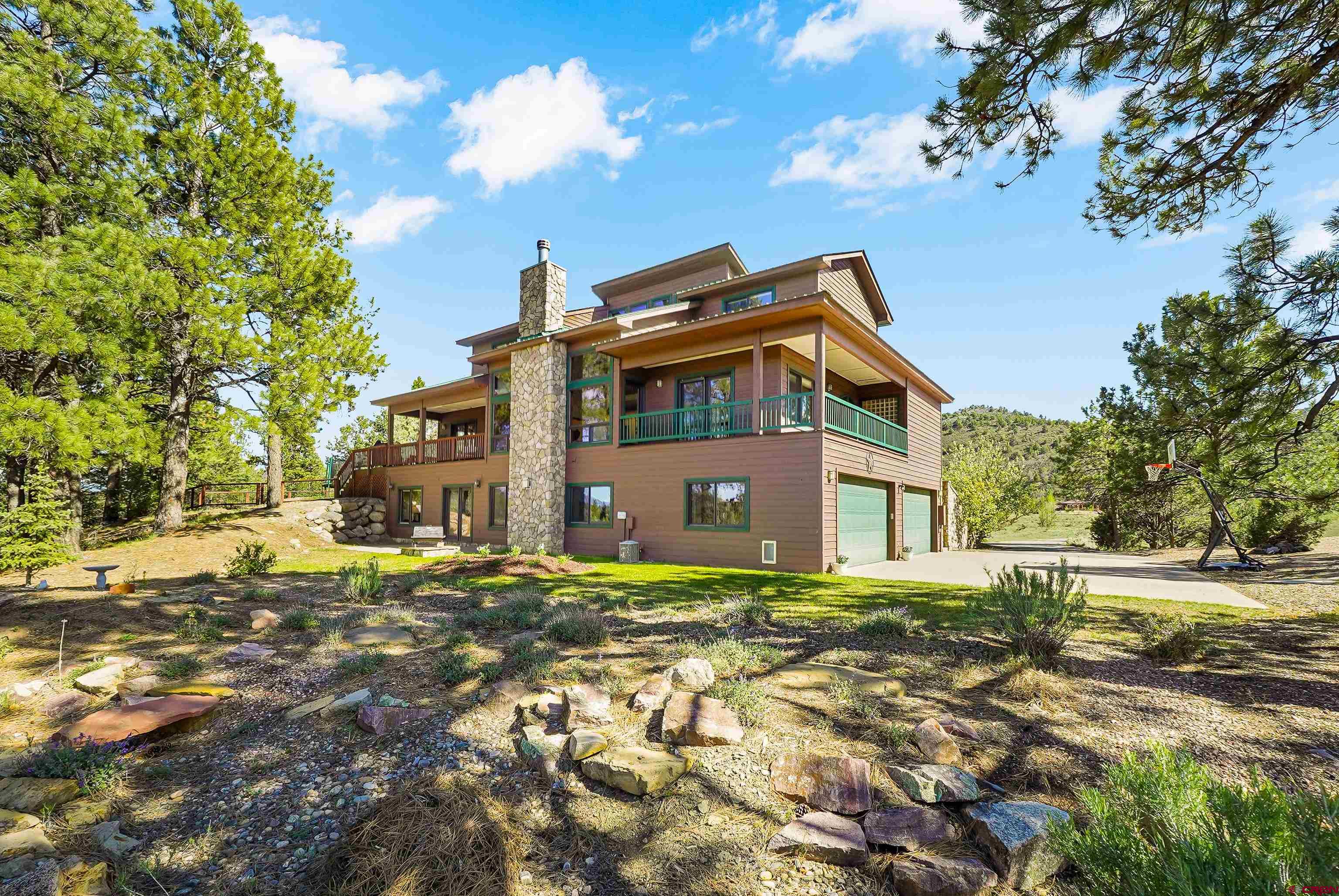 287 Wildcat Road Hesperus, CO 81326 - Photo 33 of 44 a front view of a house with a yard