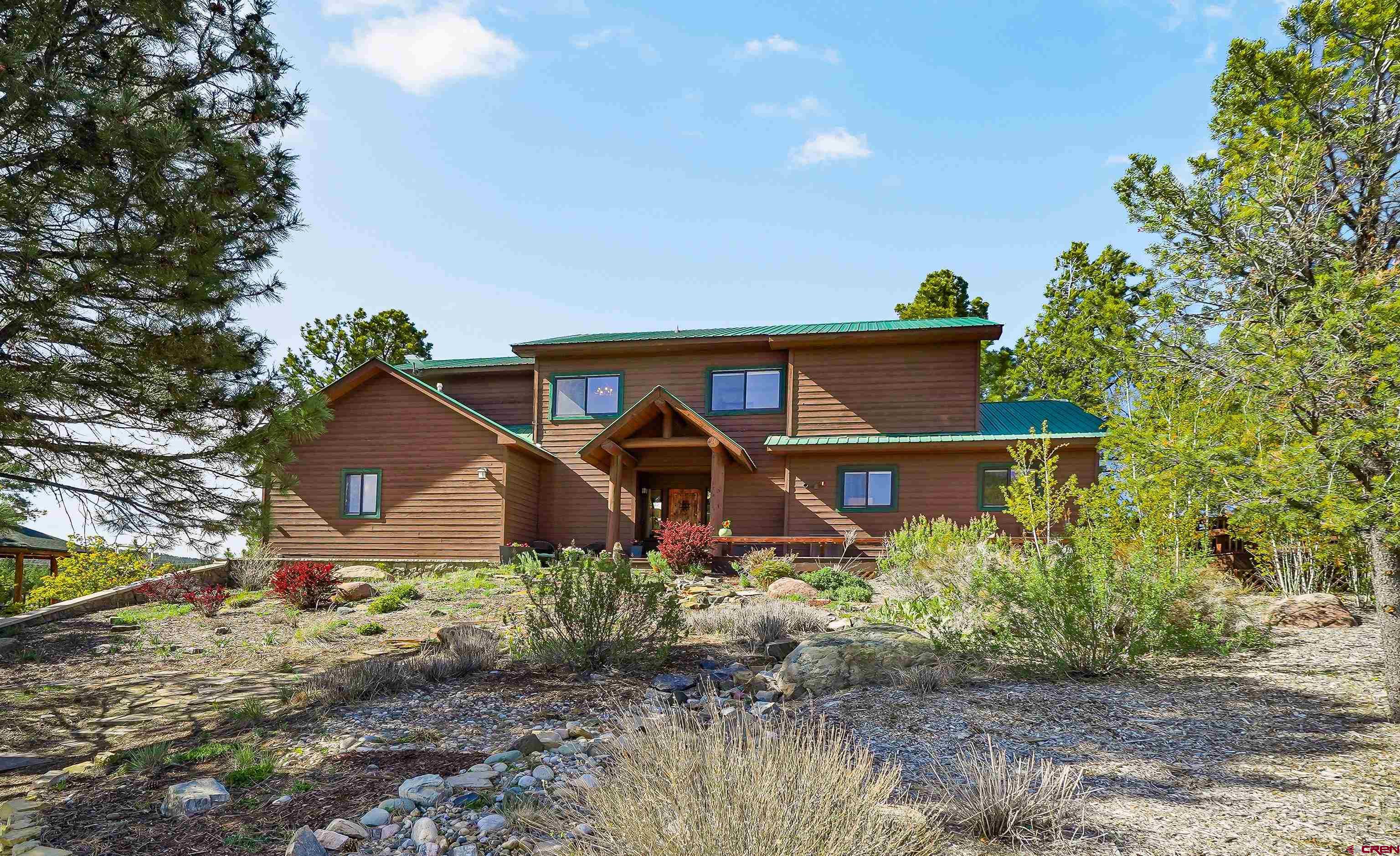 287 Wildcat Road Hesperus, CO 81326 - Photo 34 of 44 an front view of a house with a yard