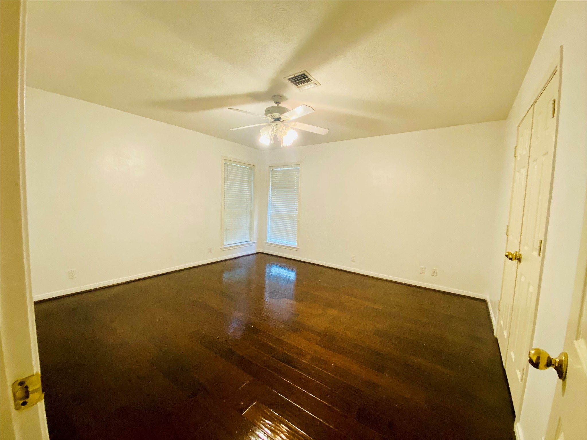 14212 Horseshoe Bend Conroe, TX 77384 - Photo 20 of 45 a view of empty room with wooden floor