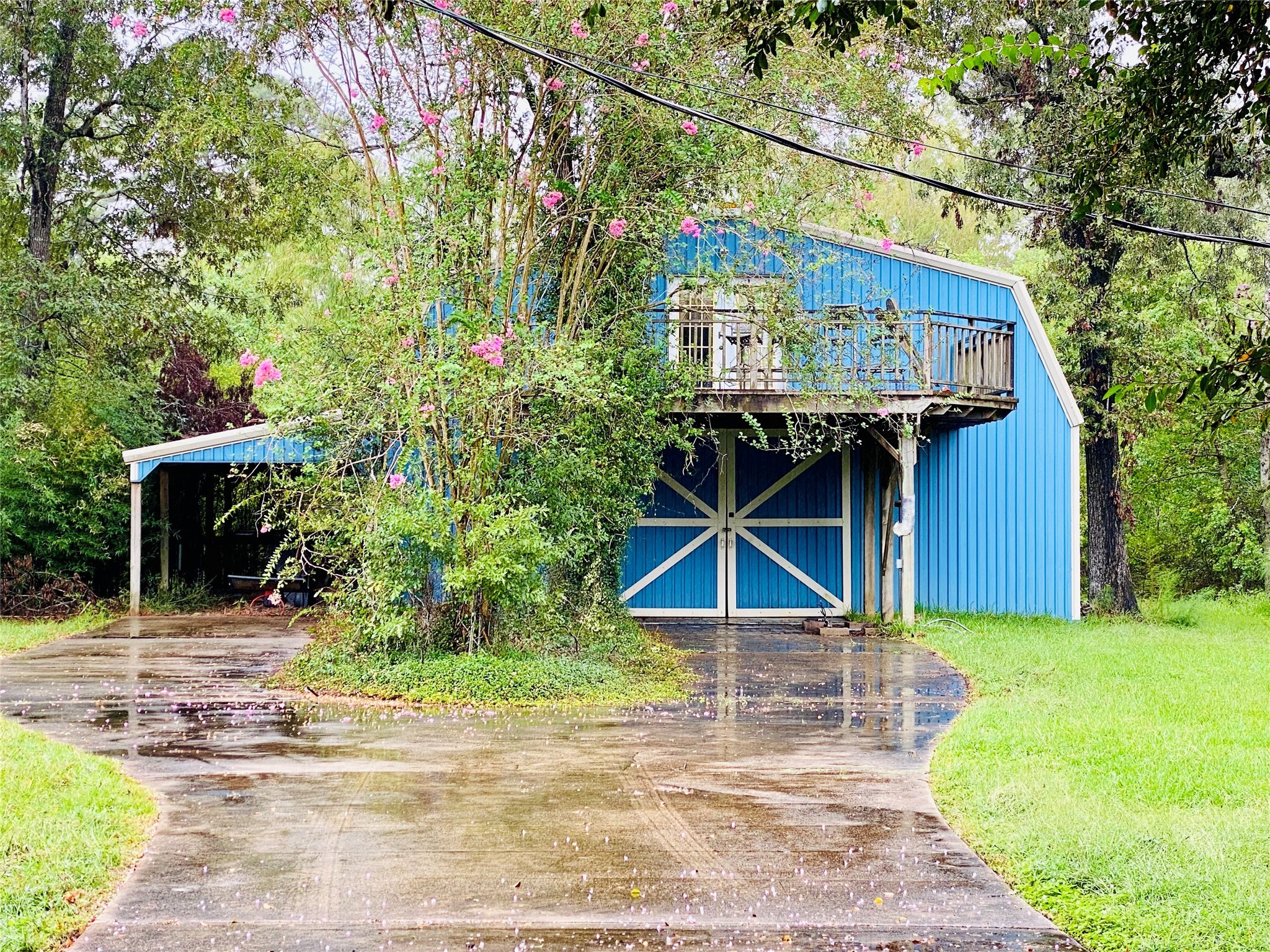 14212 Horseshoe Bend Conroe, TX 77384 - Photo 2 of 45 a view of a house with basketball court