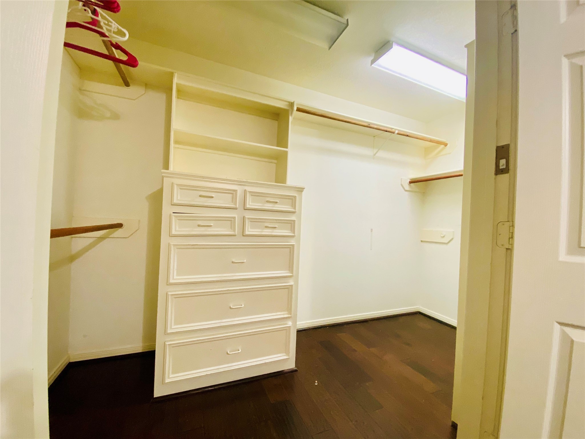 14212 Horseshoe Bend Conroe, TX 77384 - Photo 21 of 45 a view of walk in closet with empty racks