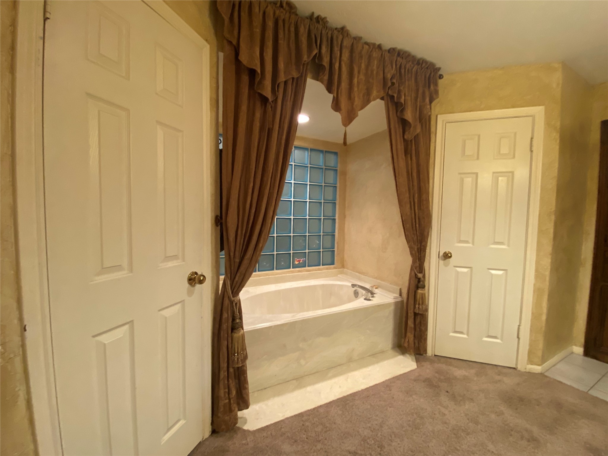 14212 Horseshoe Bend Conroe, TX 77384 - Photo 27 of 45 a bathroom with a bathtub and a shower