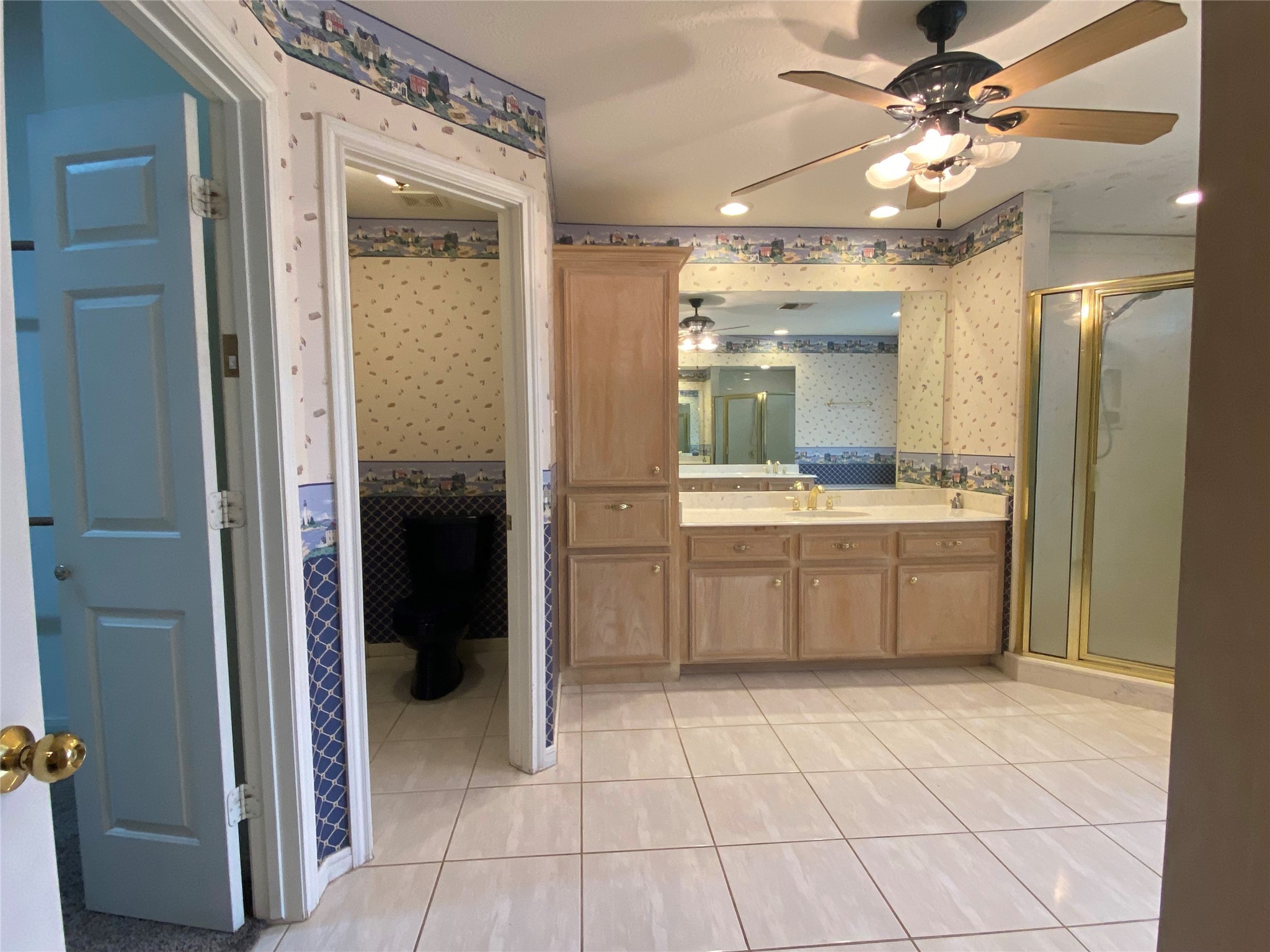 14212 Horseshoe Bend Conroe, TX 77384 - Photo 40 of 45 a bathroom with a sink a mirror and a shower