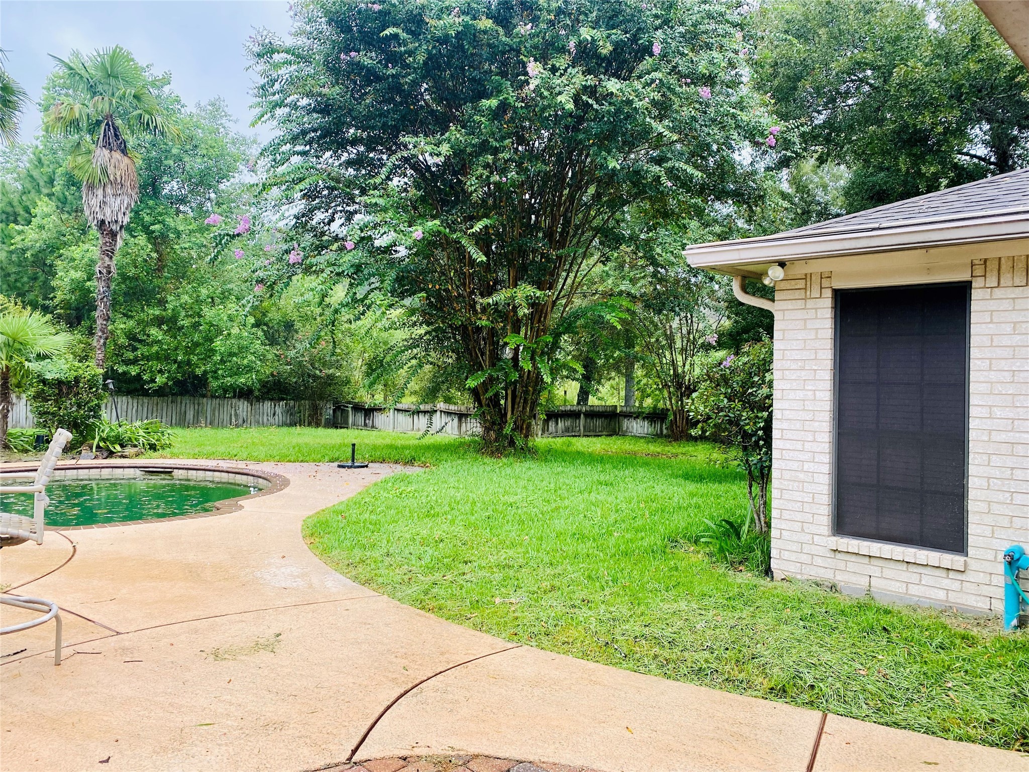 14212 Horseshoe Bend Conroe, TX 77384 - Photo 6 of 45 a view of a house with a yard