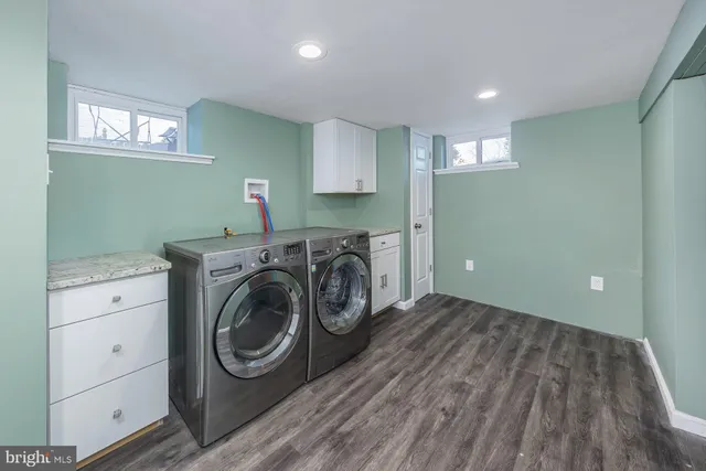 a view of a storage & utility room with washer and dryer
