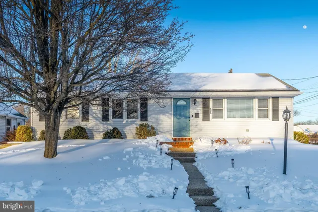 a front view of a house with patio
