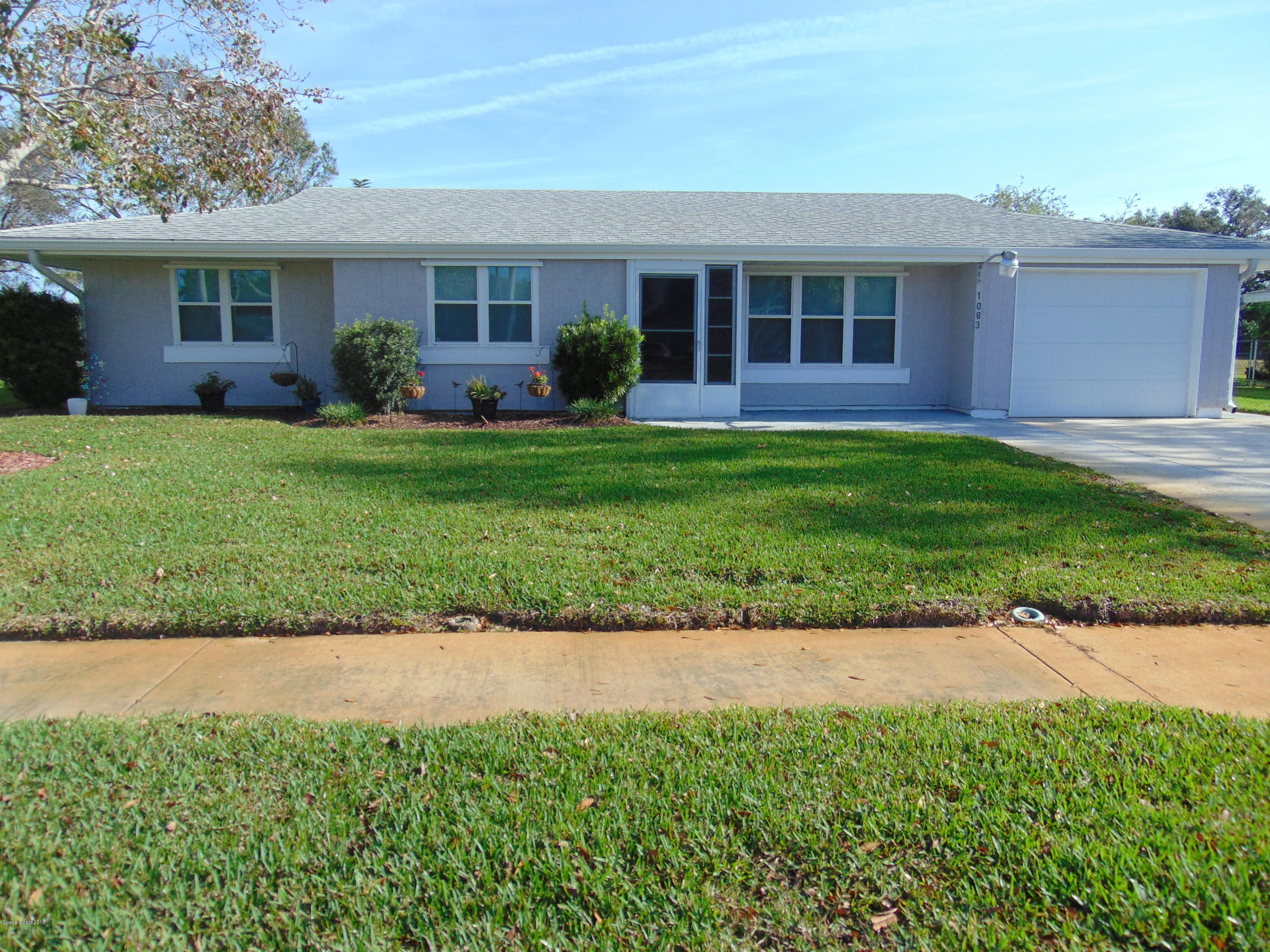 1083 Cromey Road Northeast Palm Bay, FL 32905 - Photo 1 of 39 Front
