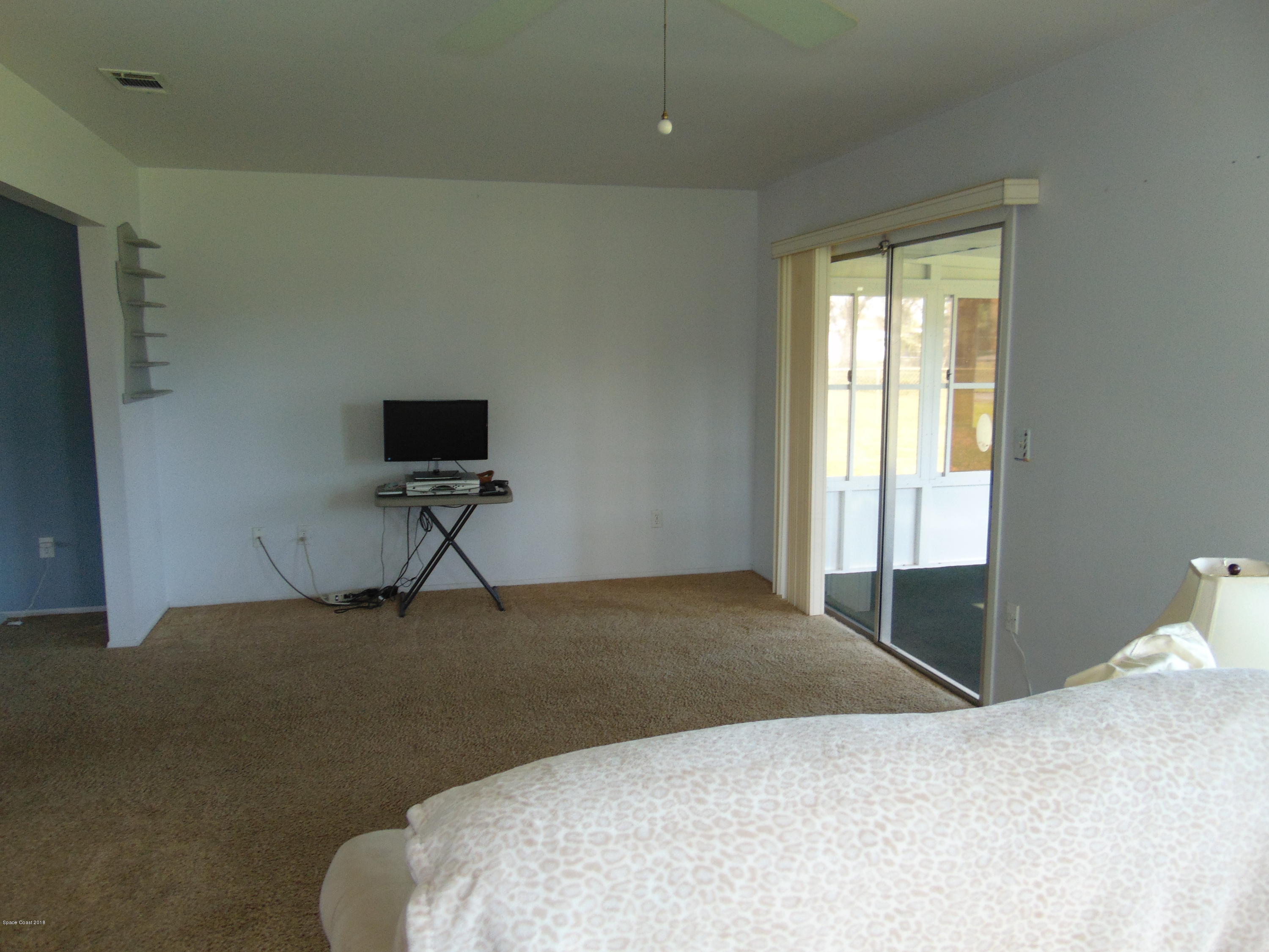 1083 Cromey Road Northeast Palm Bay, FL 32905 - Photo 12 of 39 Family Room 2