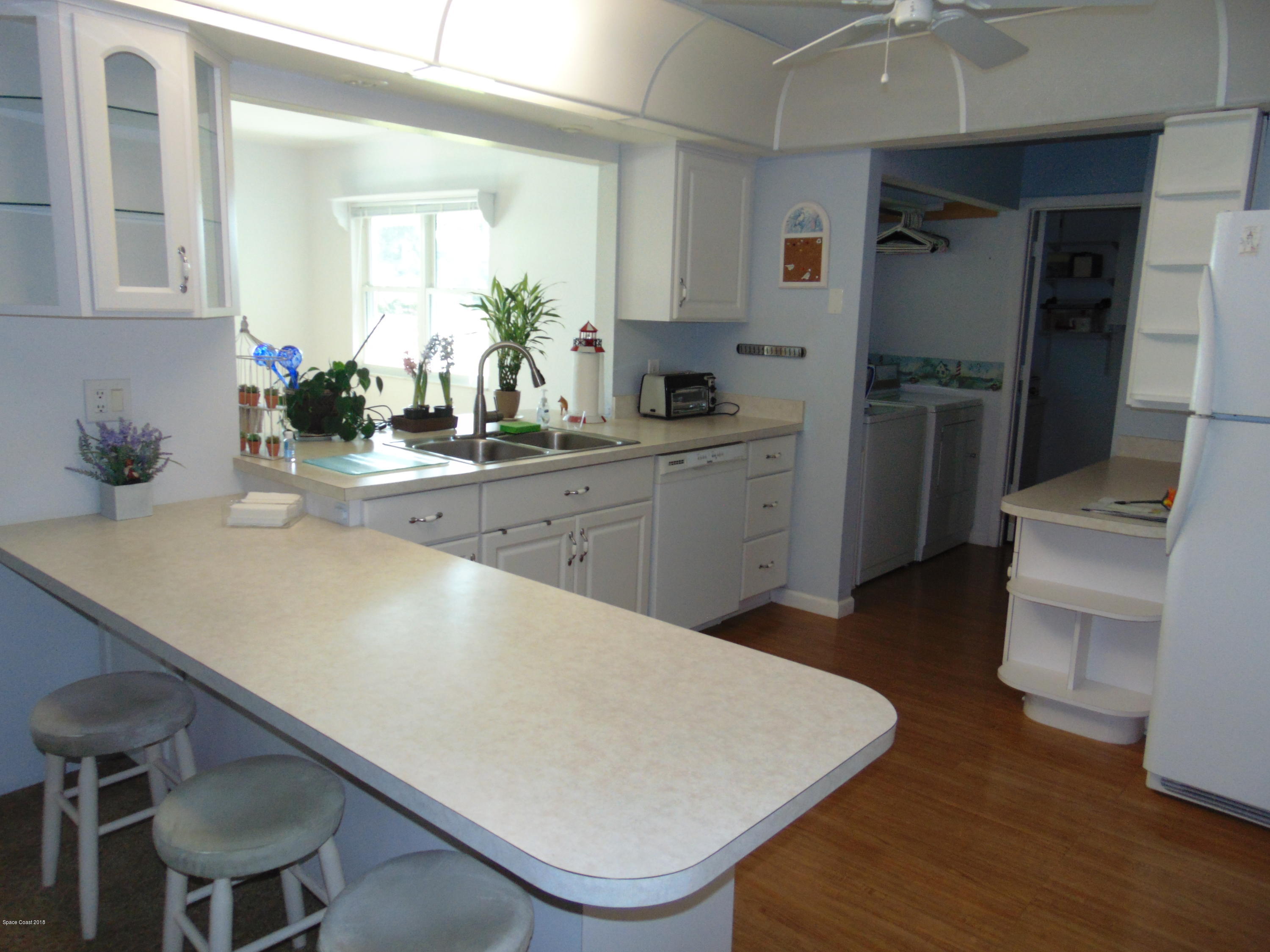 1083 Cromey Road Northeast Palm Bay, FL 32905 - Photo 3 of 39 Kitchen 1