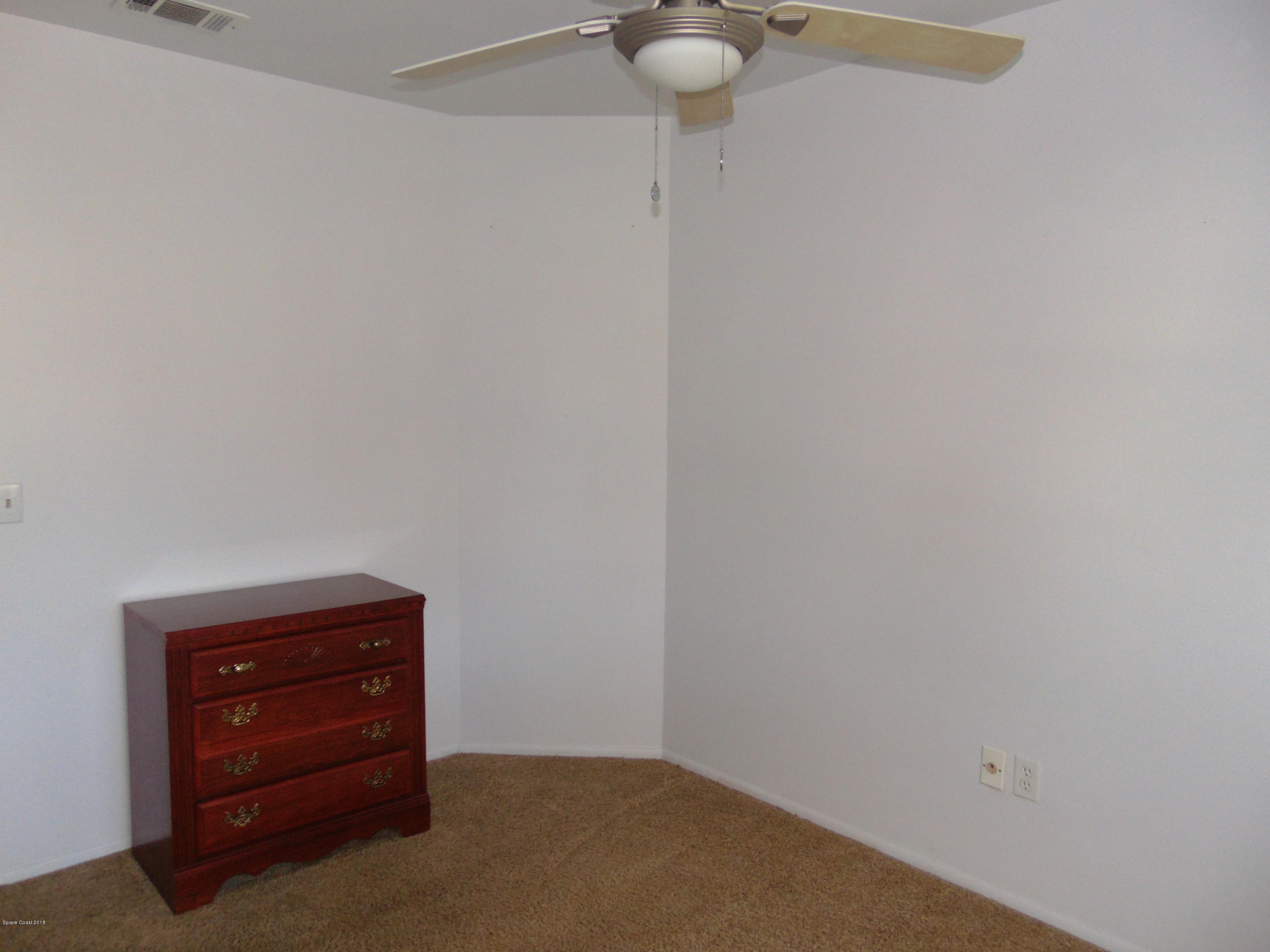 1083 Cromey Road Northeast Palm Bay, FL 32905 - Photo 22 of 39 Bedroom 2