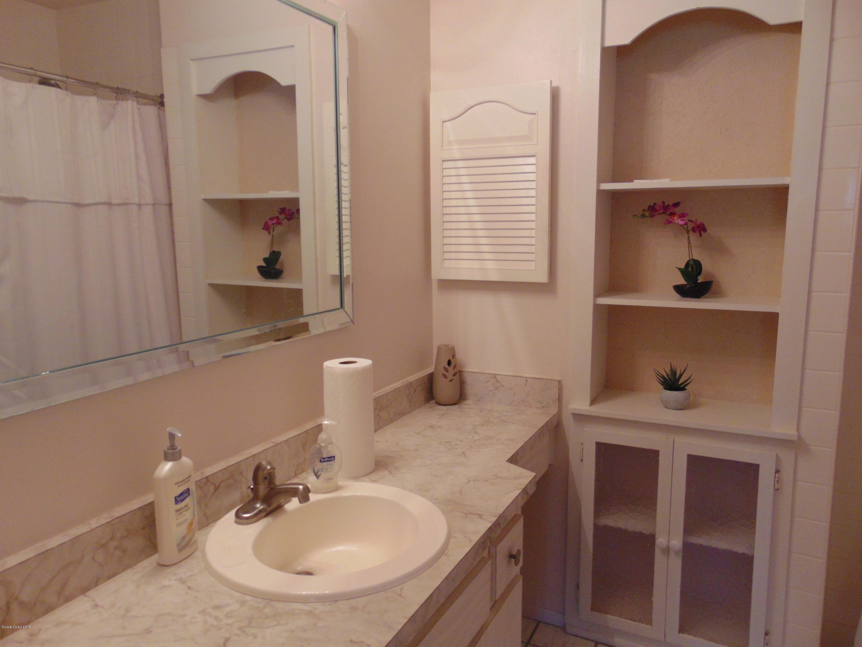 1083 Cromey Road Northeast Palm Bay, FL 32905 - Photo 24 of 39 Guest Bath