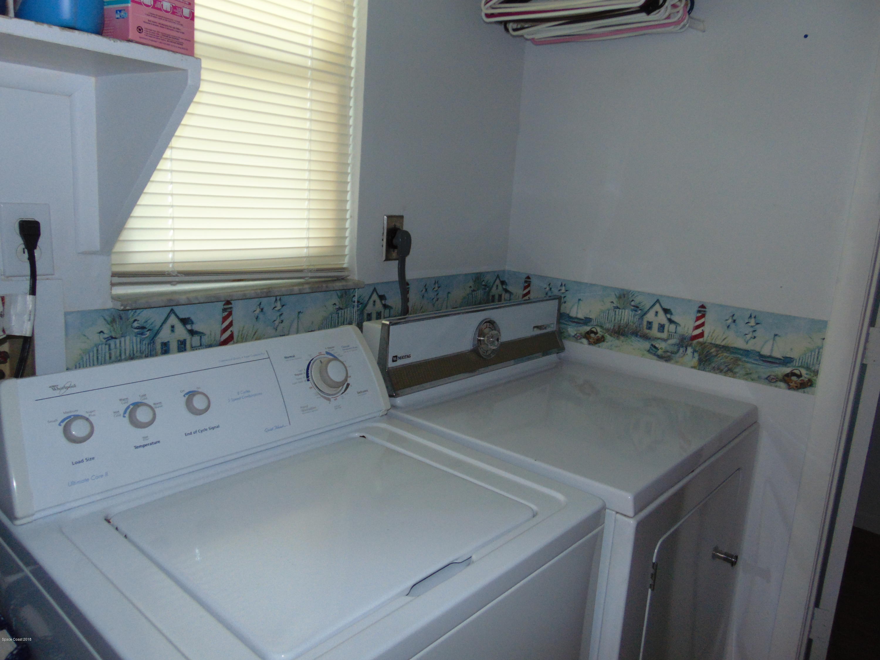 1083 Cromey Road Northeast Palm Bay, FL 32905 - Photo 25 of 39 Inside Laundry