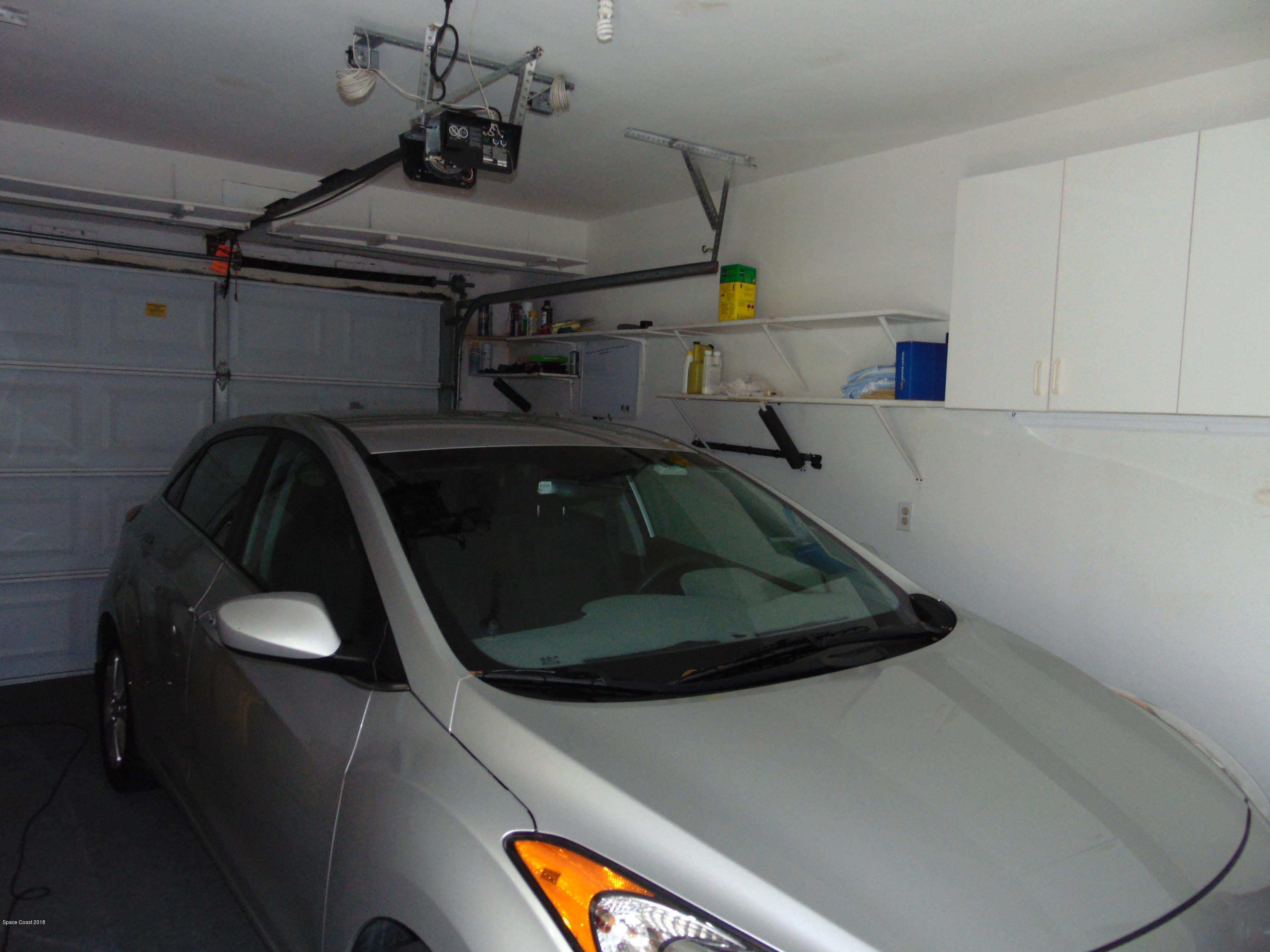1083 Cromey Road Northeast Palm Bay, FL 32905 - Photo 32 of 39 Roomy garage