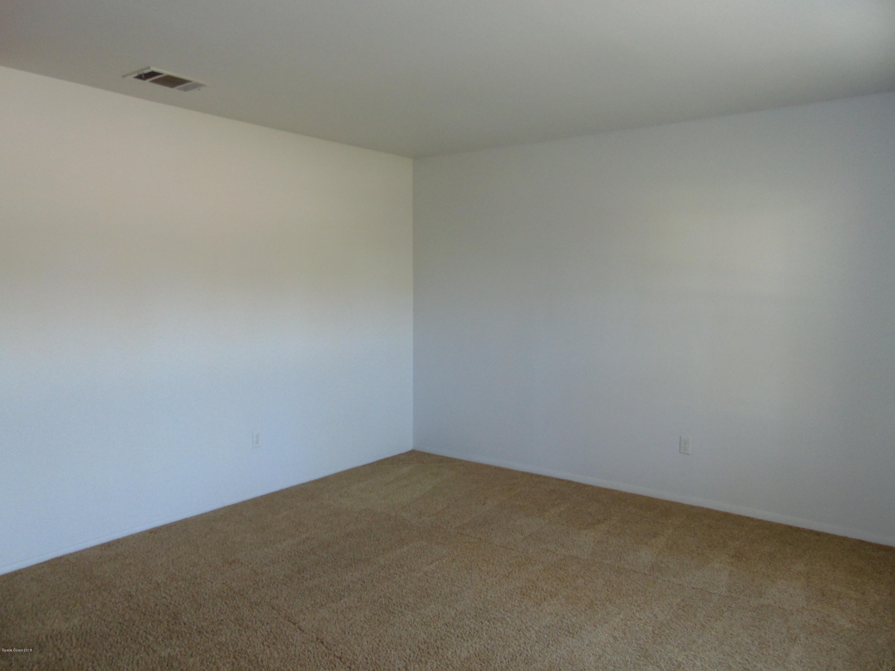 1083 Cromey Road Northeast Palm Bay, FL 32905 - Photo 9 of 39 LR 2